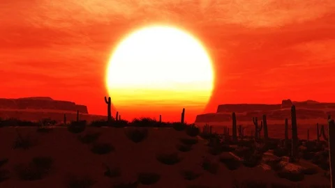 The sun sets behind a mesa in the desert Video stock 72166818