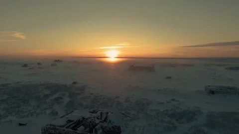 The sun sets behind the ruined building Stock Footage 126925525