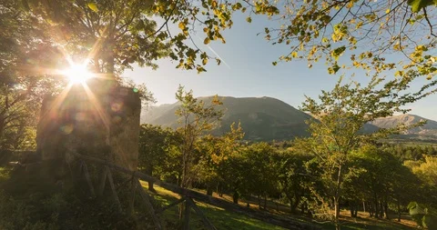 The sun sets behind the SIbilla mountain Stock Footage 118903038