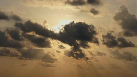 The sun sets with black clouds moving through.Time Lapse Stock-Footage 108306761