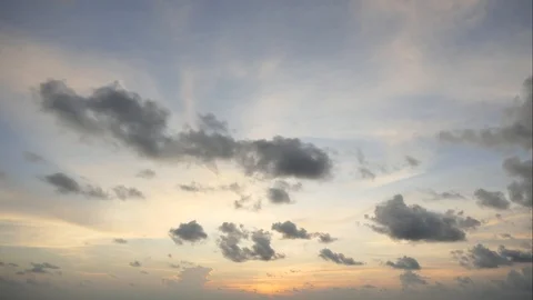 The sun sets with black clouds moving through.Time Lapse Stock-Footage 108306845