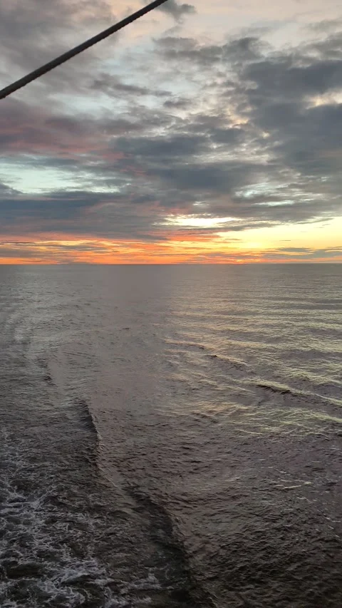 The sun sets in the evening aboard the ship. Stock Footage 311489844