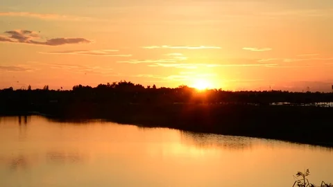 Sun sets into the horizon Stock Footage 77196639