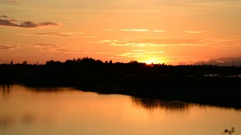 Sun sets into the horizon Stock Footage 77196693