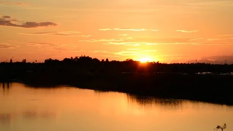 Sun sets into the horizon Stock Footage 77196709