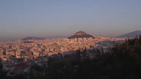 The sun sets over Athens, Greece. 스톡 동영상 165220480