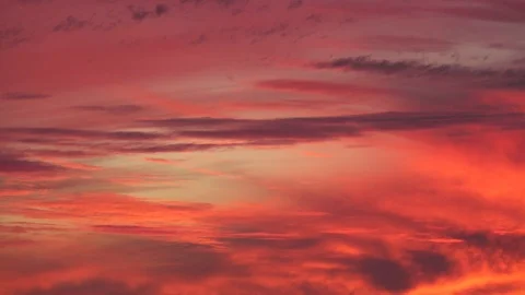 The sun sets over the beach at sunset. Stock Footage