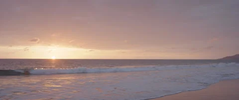 Sun sets over cinematic Malibu coast Stock Footage 136447823