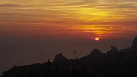 The sun sets over the horizon and the city falls asleep Stock Footage 84809927