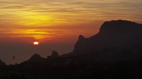 The sun sets over the horizon and the city falls asleep Stock Footage 84809940
