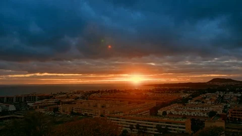 The sun sets over the horizon, dramatic clouds, storm cloud. In the foreground Stock Footage 122347370