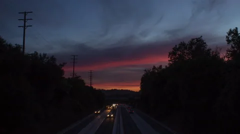 Sun Sets over Los Angeles Traffic Vídeo Stock 49967974