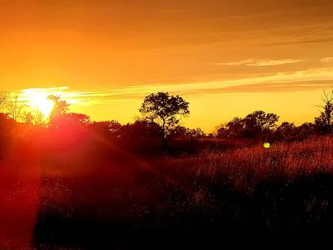 The sun sets over South Post on Sept. 10, 2022, at Fort McCoy, Wis. Fort M... Fotos Stock