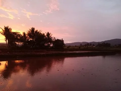 The sun sets Stock Photos