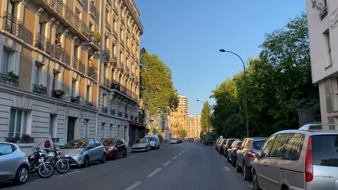 The sun sets on sleepy Paris during covid-19 confinement Stock Footage 129415136