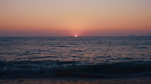 The Sun sets on a tropical sandy beach Stock Footage 119126586