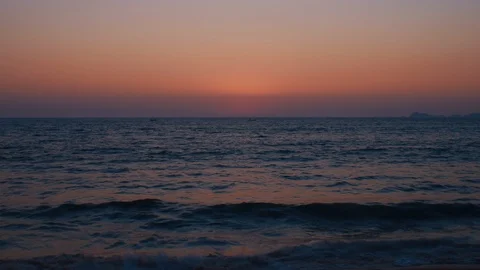 The Sun sets on a tropical sandy beach Stock Footage 119128661