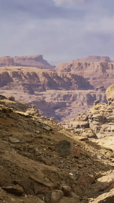 As the sun sets, vibrant hues paint the rocky terrain Stock Footage 334253542