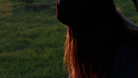 Sun sets, wind blows, as teen sketches weird images Stock Footage 101875058