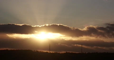 The sun settibng over telecommunications masts from The Beacon, above Loughbo Stock Footage 239436418