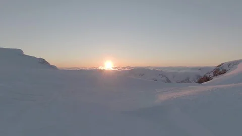 Sun setting behind the beautiful mountain alps Video stock 119124337