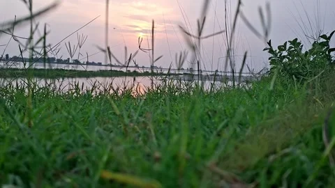 Sun Setting Behind Calm Water Body Horizon Stockbeeldmateriaal 340046122