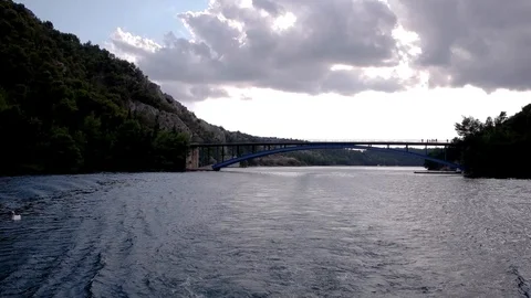 Sun Setting behind clouds sea landscape shot Video stock 87768072