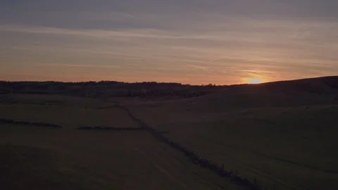 Sun Setting Behind Forest Ridge, Aerial View Stock Footage 346798272