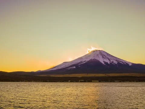 Sun setting behind Mount Fuji, Japan. Stock Photos