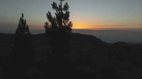 Sun setting behind mountains in the Canary Islands Stock Footage 315131444