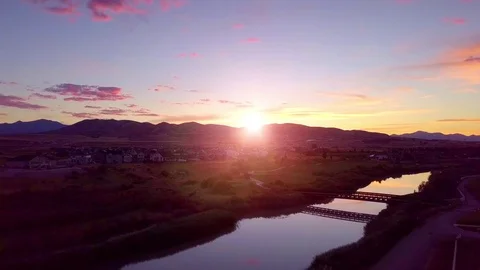 Sun setting behind the mountains Stock Footage 113534341