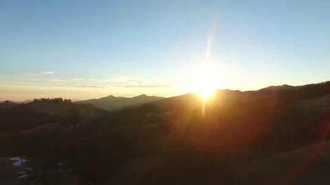 Sun setting behind the mountains on a national park in Italy. Stock Footage 81190106