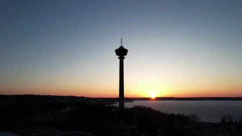 Sun setting behind Näsinneula tower Video stock 243117697