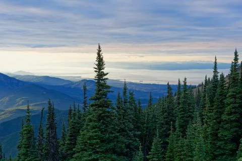 Sun setting behind the Olympic Mountains Stock Photos