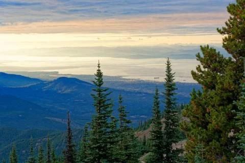 Sun setting behind the Olympic Mountains Stock Photos