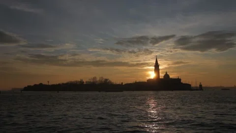 Sun setting behind the San Giorgio Maggiore isle, Venice, Italy Stock Footage 141398702