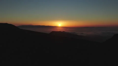 Sun setting behind Teide volcano seen from Gran Canaria 库存影片 313443756