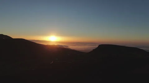 Sun Setting Behind Teide Volcano from Gran Canaria Stock Footage 313443788