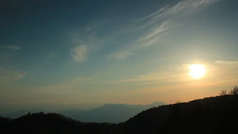 The Sun Setting Beyond the Northern Alps Stock Footage 327535349