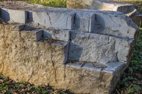 Sun setting on carved rock Stock Photos