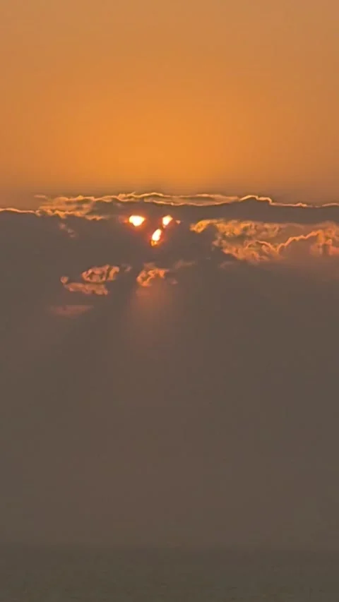 Sun setting into clouds over the sea at Pointe du Grouin, Brittany Stock-Footage 346368467