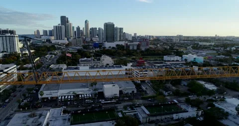 Sun setting on construction crane in Miami Stock Footage 172507202