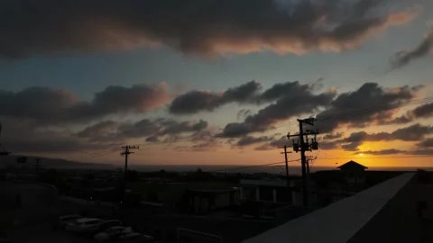 Sun setting with dark clouds 스톡 동영상 300523721