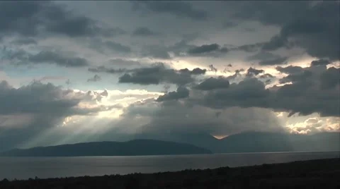 Sun setting down behind lake Ohrid in Ohrid, Macedonia Stock Footage 49786666