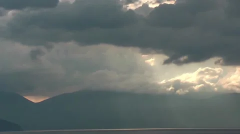 Sun setting down behind lake Ohrid in Ohrid, Macedonia Stock Footage 49787020