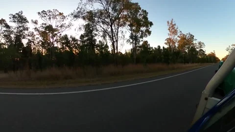 Sun setting during a highway drive Stock Footage 313822483