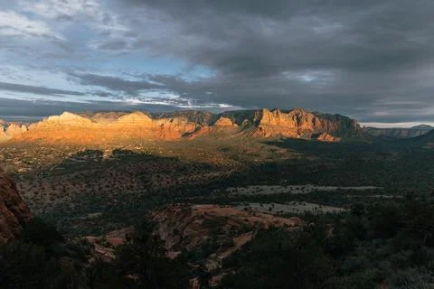Sun setting on the eastern mountain in Sedona Arizona in January. Stock Photos