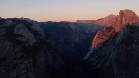 Sun setting on half dome at yosemite recorded from glacier point Stock Footage 81803840