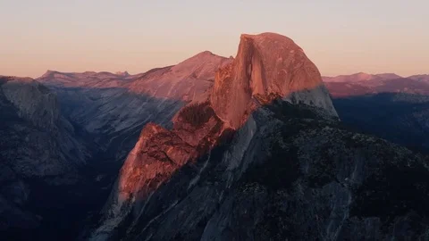 Sun setting on half dome at yosemite recorded from glacier point Stock Footage 81803842