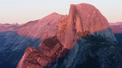 Sun setting on half dome at yosemite recorded from glacier point Stock Footage 81803845